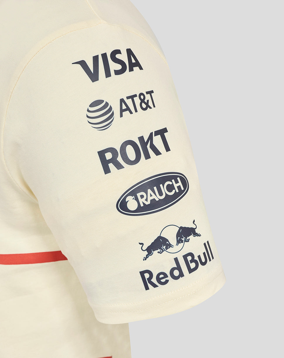 Cream T-shirt sleeve with sponsor logos including Visa AT&T ROKT Rauch and Red Bull.