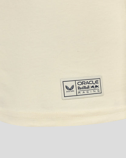 Hem close up of a sewn Oracle Red Bull Racing label on a cream Heritage T-shirt.