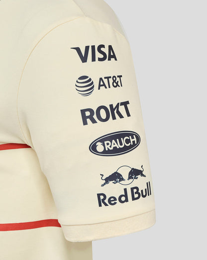 Cream polo sleeve with stacked sponsor logos including Visa AT&T ROKT Rauch and Red Bull.