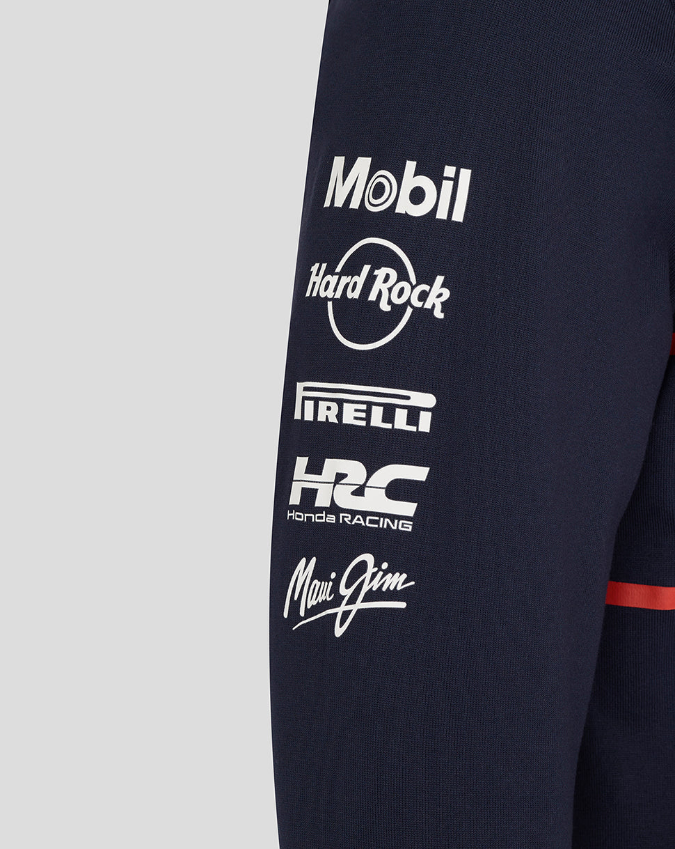 Close up of navy polo sleeve showing Mobil Hard Rock Pirelli Honda Racing and Mai Jim logos