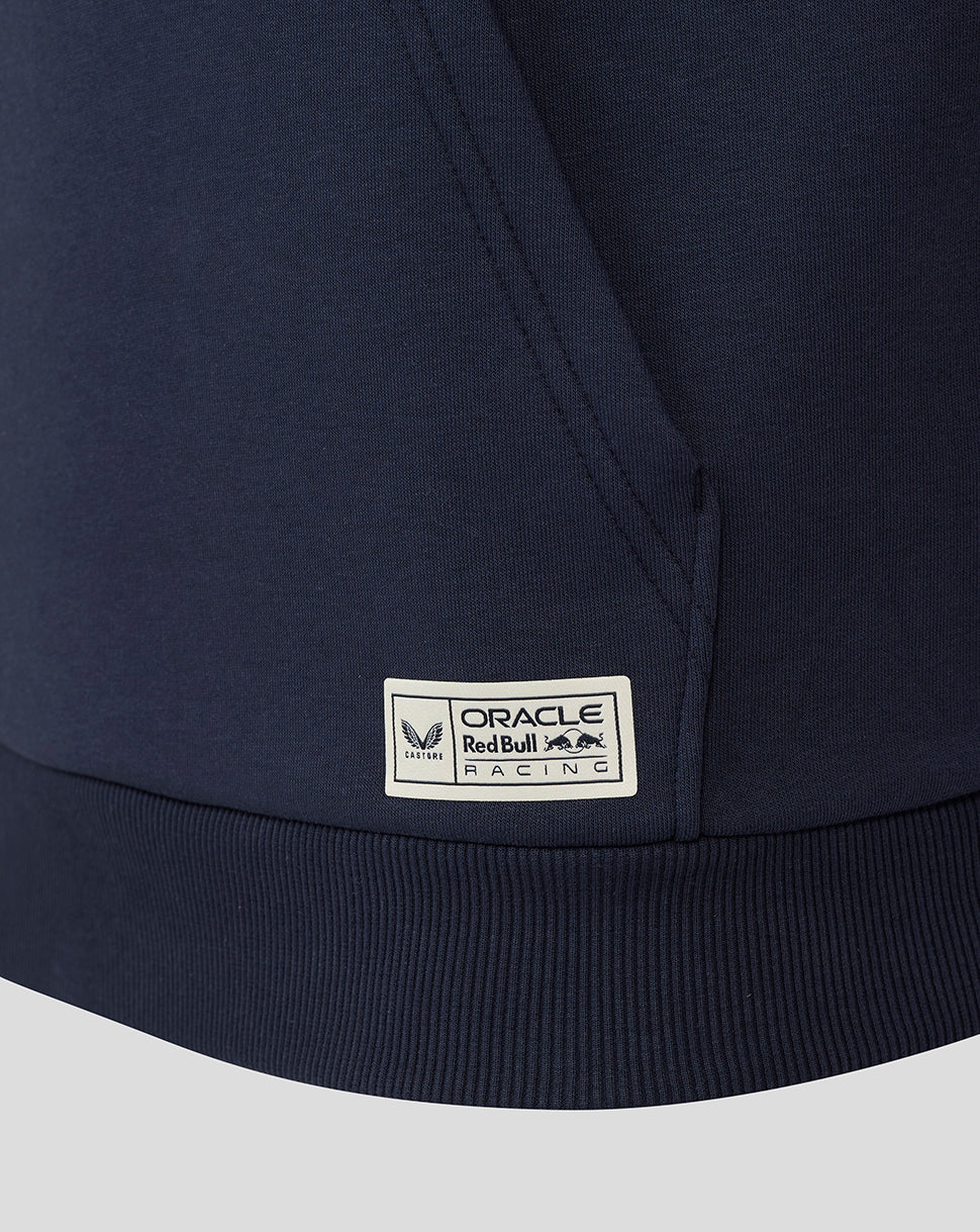 Close-up of the hoodie hem with the Oracle Red Bull Racing label on a navy Night Sky hoodie.