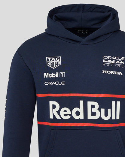 Close up of navy hoodie chest area showing the Red Bull graphic and sponsor badges on the left side