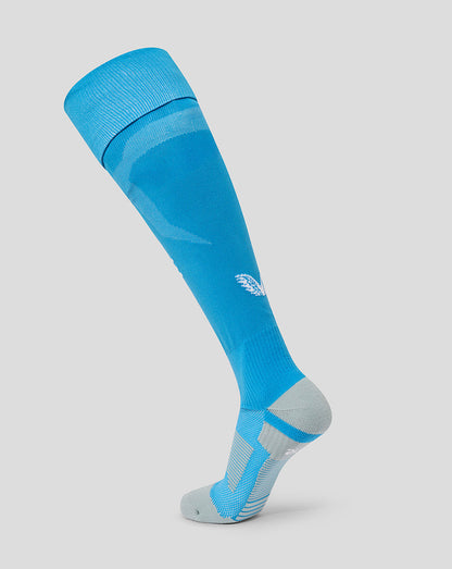 Bright blue Preston 25/26 third goalkeeper sock shown on a leg with a white emblem.