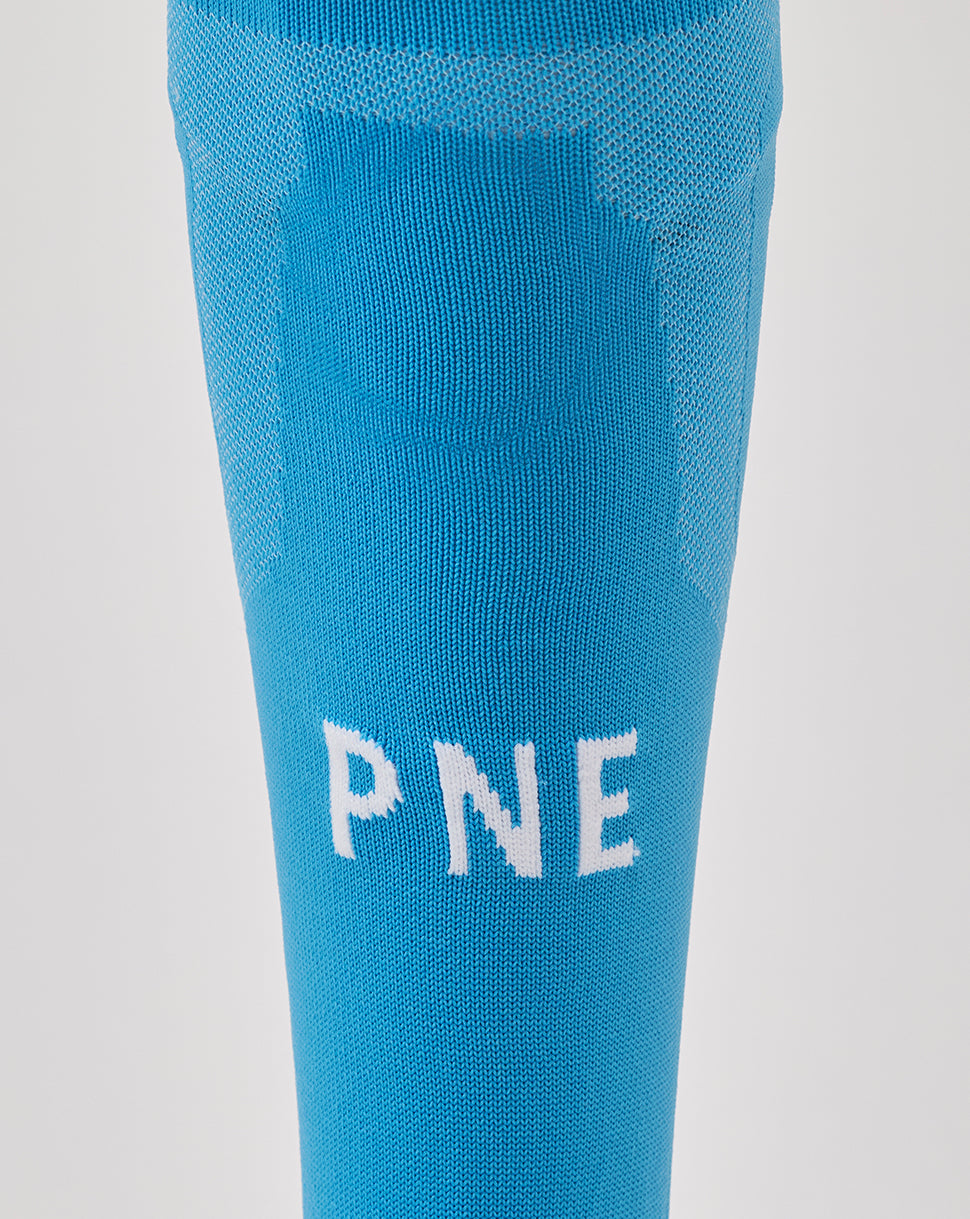 Blue Preston 25/26 third goalkeeper sock close up with white PNE lettering.