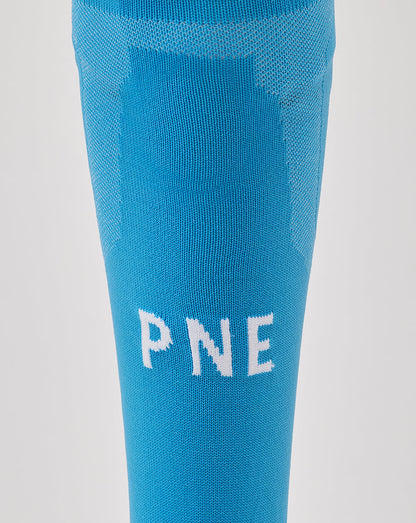 Blue Preston 25/26 third goalkeeper sock close up with white PNE lettering.