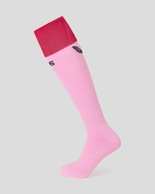 Harlequins Junior away sock in pink with a bright red cuff and a black Quins wordmark along the shin.