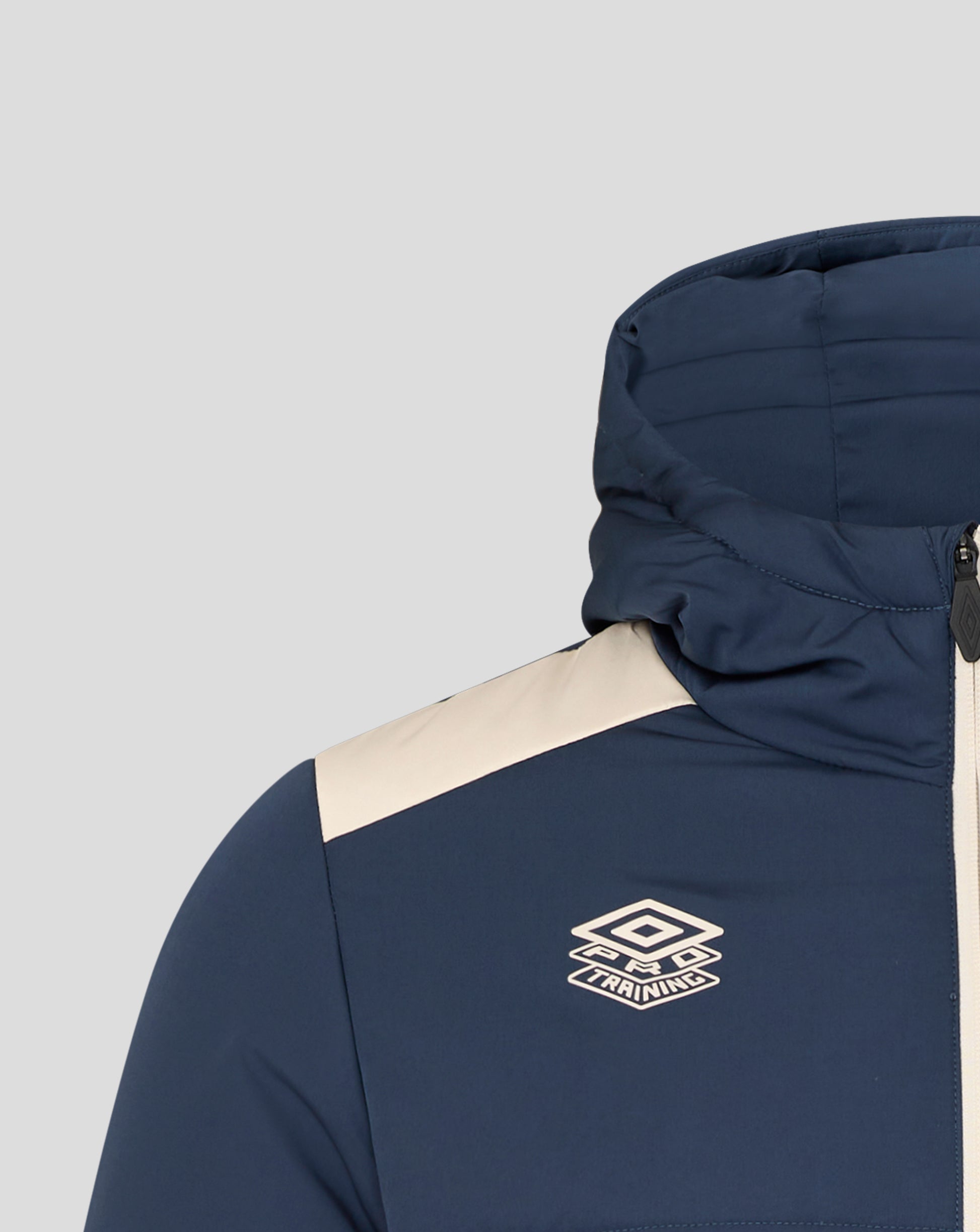 Hooded navy West Ham Pro Training padded jacket featuring a beige stripe and the Umbro Training logo on the chest.