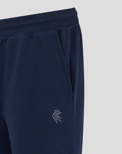 Close up of navy Rangers joggers waistband with ribbed elastic and a partial Rangers crest visible near the thigh