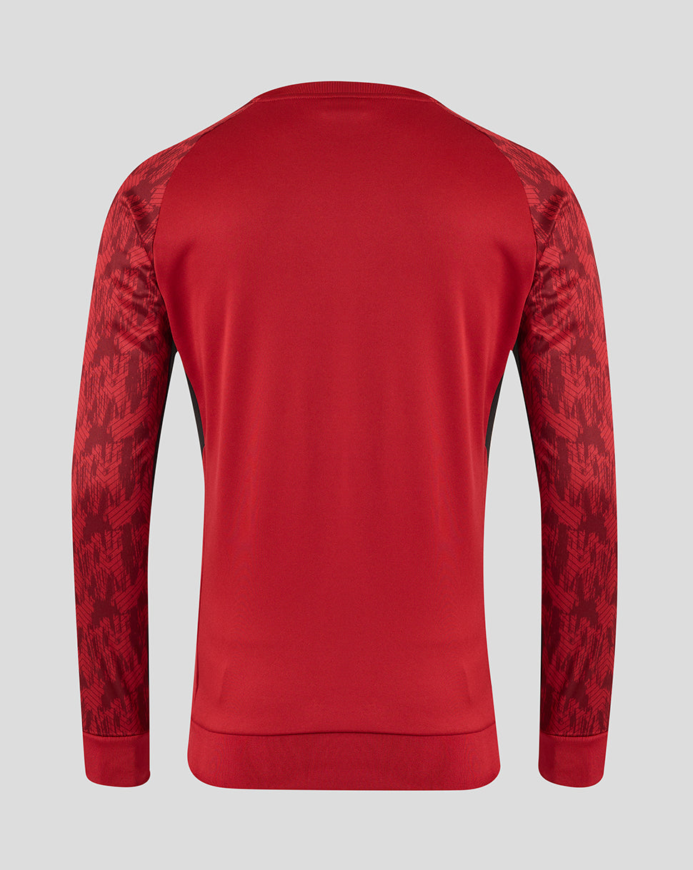 Back view of rhythmic red Saracens training sweatshirt with patterned sleeves.