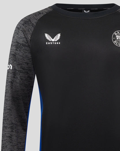 Close up of Castore logo on left chest and Bath Rugby crest on right on a black training sweatshirt with marled grey sleeves.
