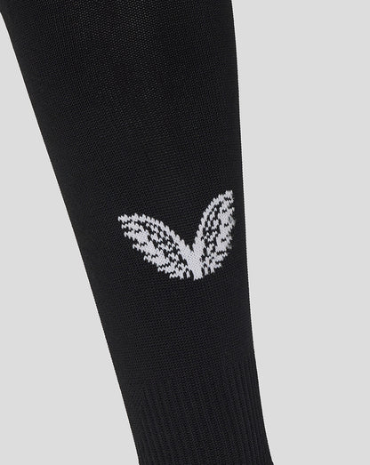 White leaf-like logo on black knit sock from England Rugby alternate footless sock