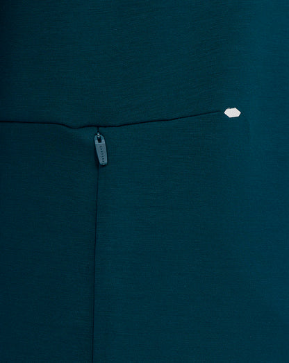 Close-up of Reflecting Pond teal England Rugby Travel Crew Sweatshirt showing a zip pocket and Castore branding