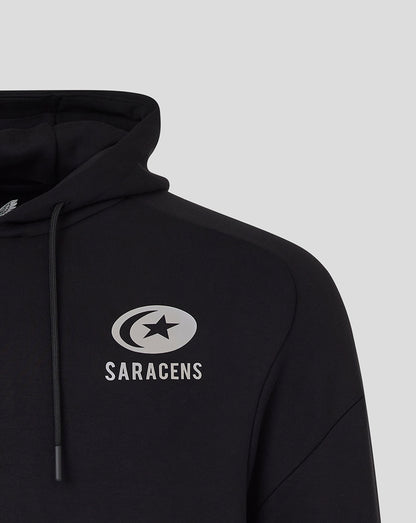 Black Saracens travel hoodie close-up of chest with circular crest and SARACENS lettering
