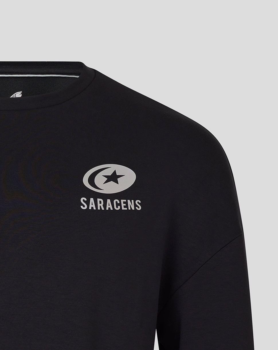 Close-up of Saracens logo on chest of black sweatshirt.