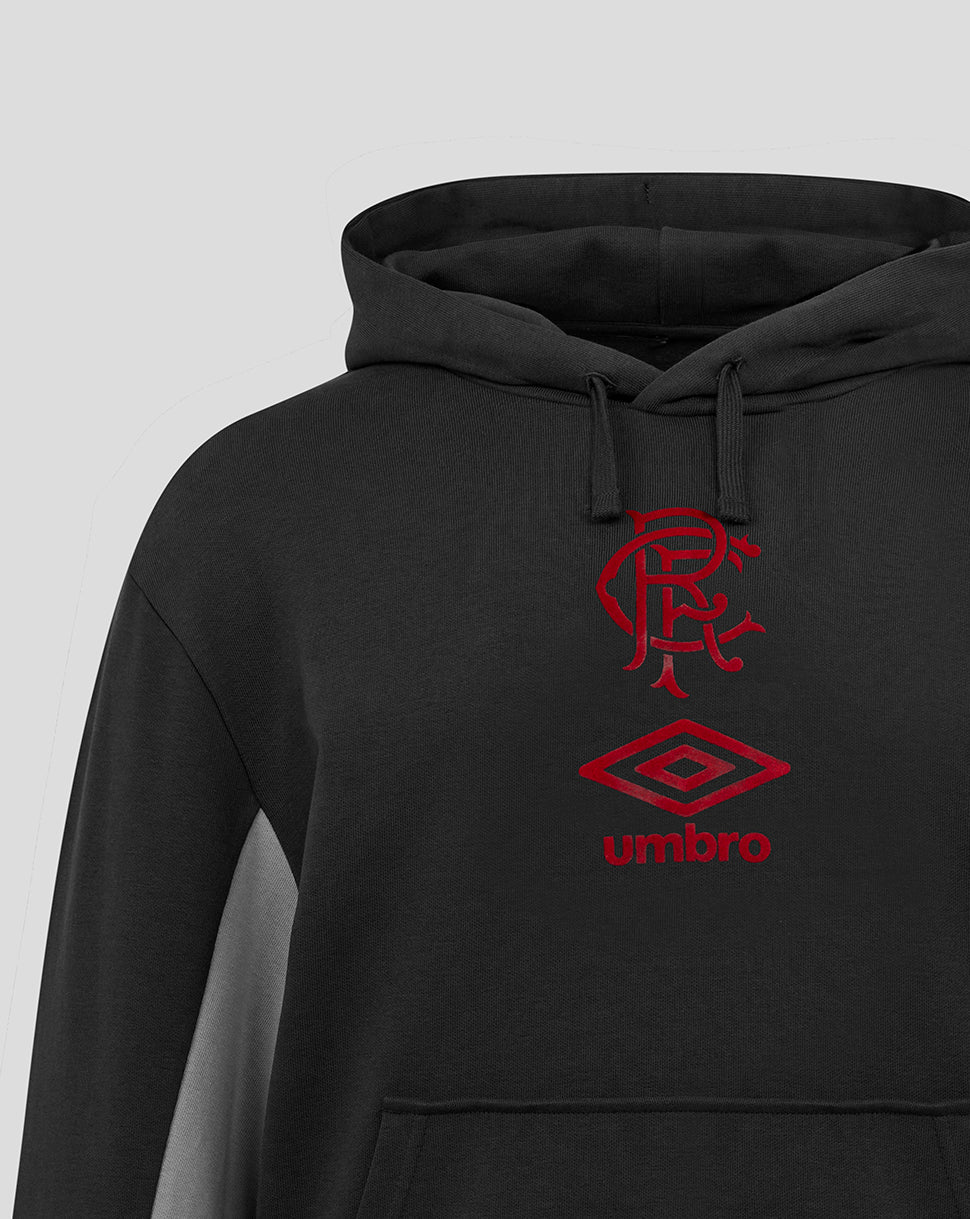 Front chest close up of black Rangers hoodie with red crest above Umbro logo