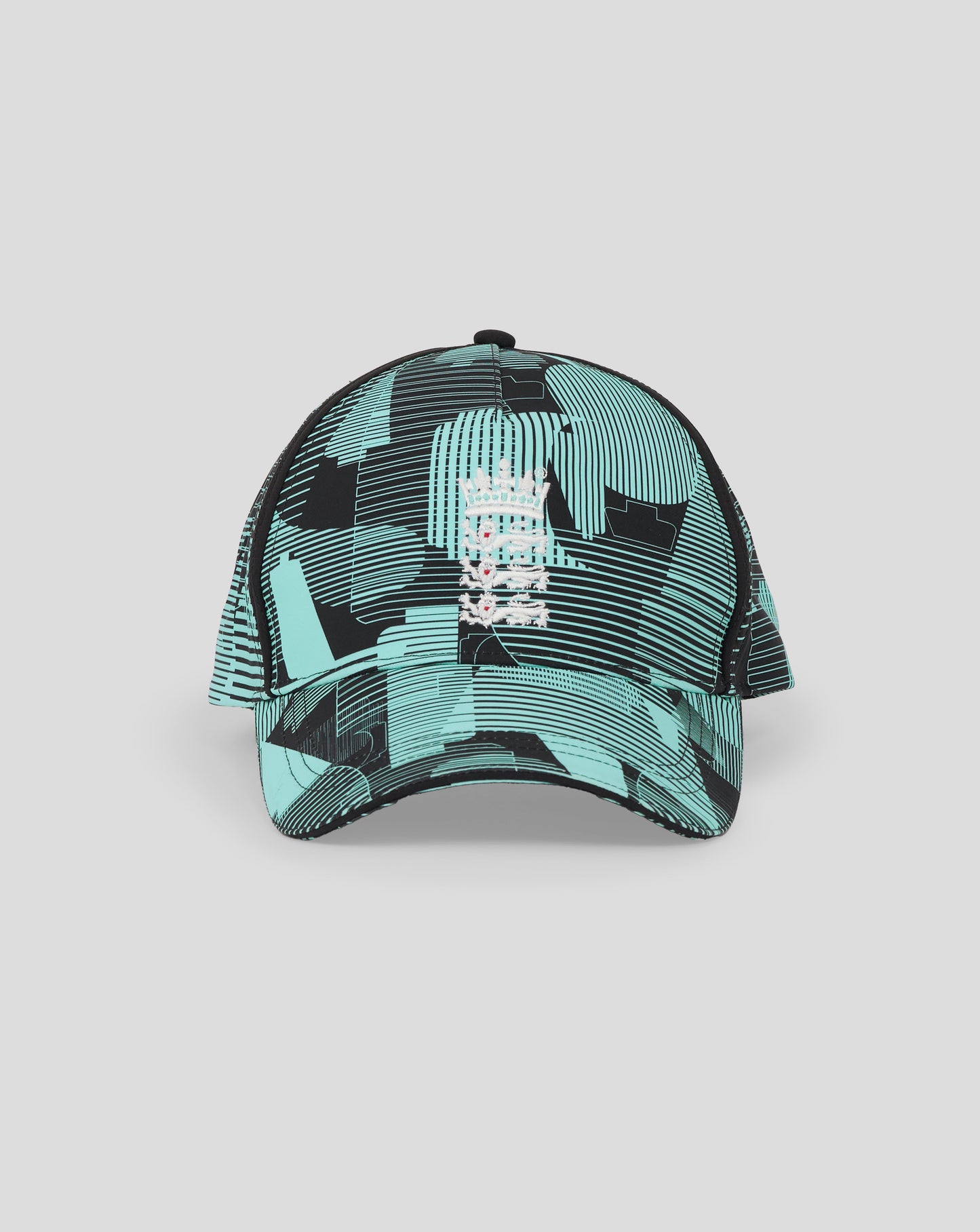 Top view of England 25/26 Ashes cap featuring teal and black geometric pattern and central button