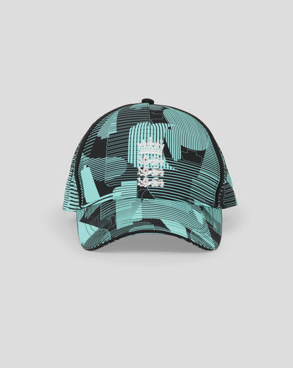 Top view of England 25/26 Ashes cap featuring teal and black geometric pattern and central button
