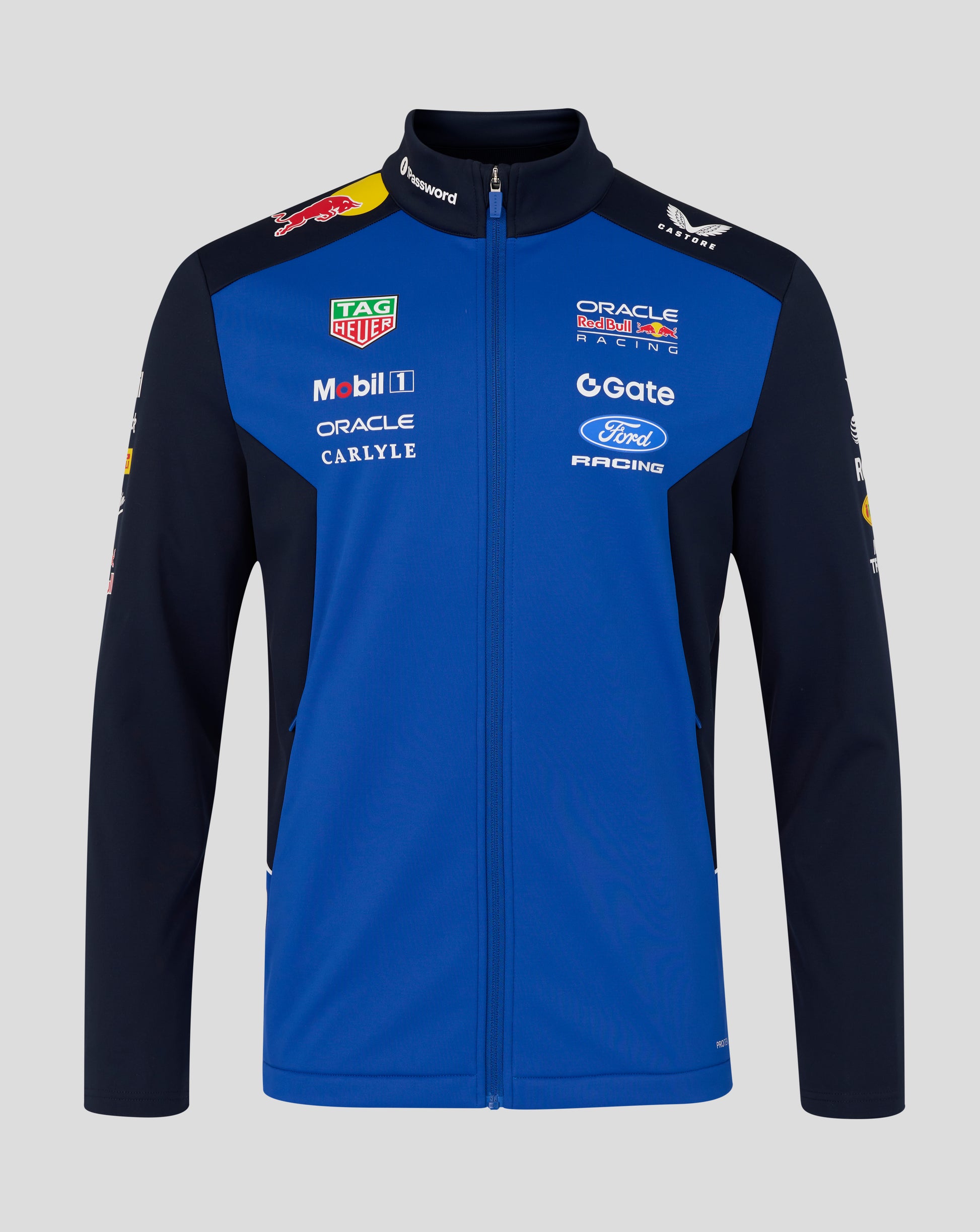 Front view of a model wearing a blue and navy Teamline jacket with multiple sponsor logos on the chest.