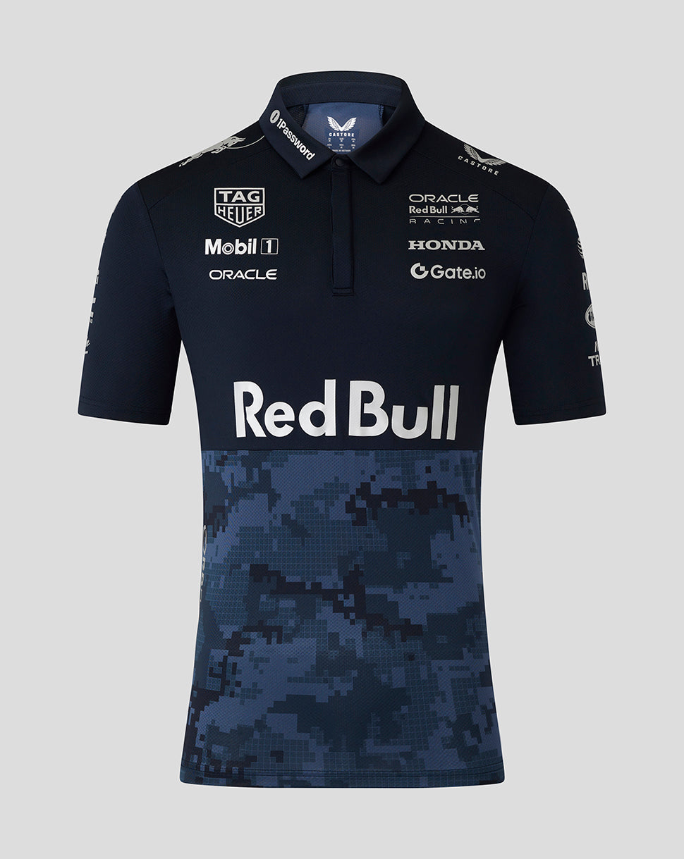 Oracle Red Bull Racing track polo in night sky navy with a large Red Bull logo and a pixelated blue camo panel across the lower torso and sponsor logos.
