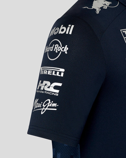 Shoulder view of the navy track polo displaying Mobil Hard Rock Pirelli HRC Honda Racing and Maui Jim logos.