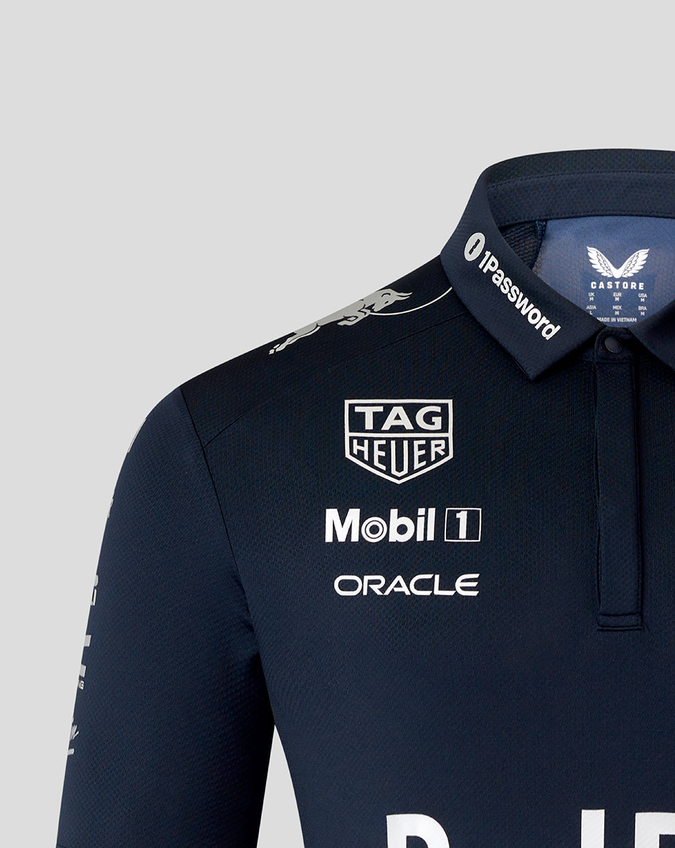 Close up of navy polo collar and chest showing sponsor logos including Tag Heuer Mobil 1 and Oracle