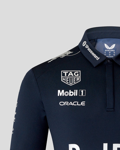 Close up of navy polo collar and chest showing sponsor logos including Tag Heuer Mobil 1 and Oracle