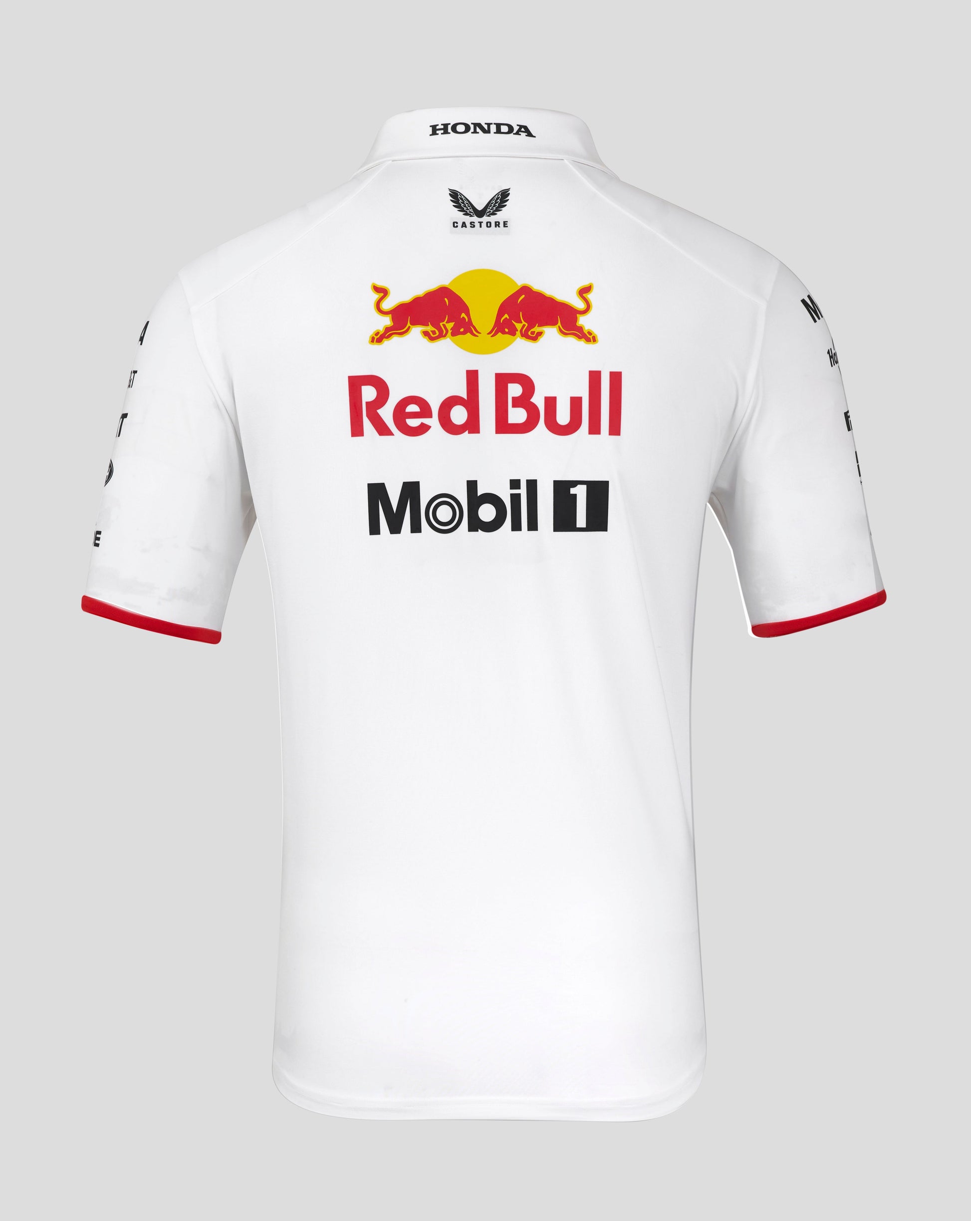 Back view of white Red Bull Racing polo featuring large Red Bull graphic and Mobil 1 branding.