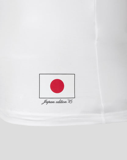 Japan edition badge with red circle on white background near the lower hem of the polo sleeve