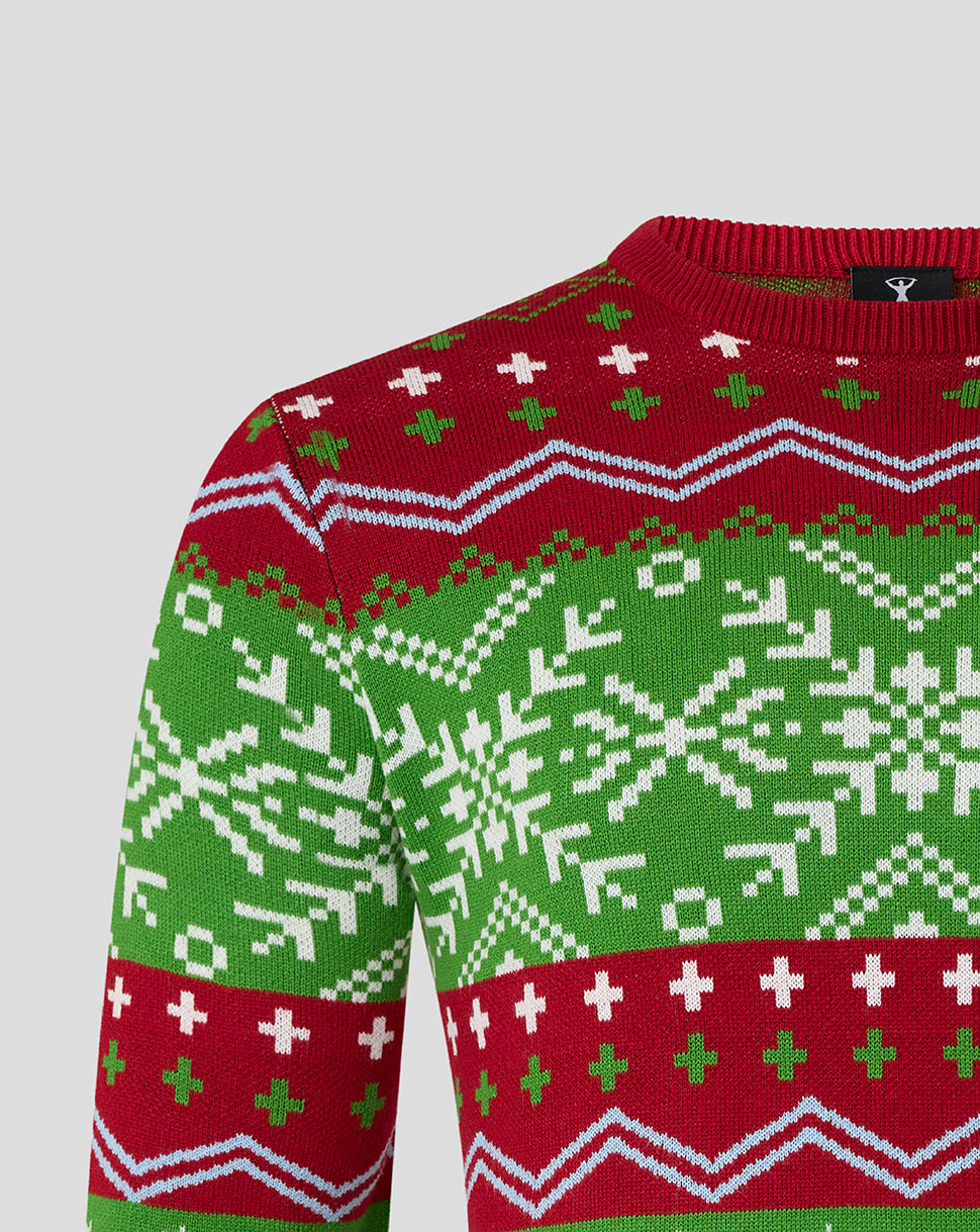 Close up of the knit on Harlequins Christmas jumper showing red green white pattern and small chest logo.