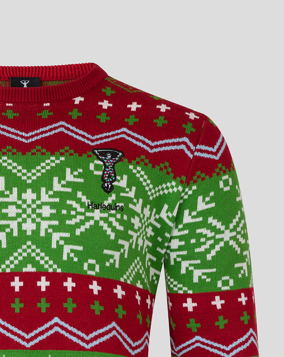 Shoulder close up of Harlequins Christmas jumper with bold knit motifs and embroidered logo near the chest.