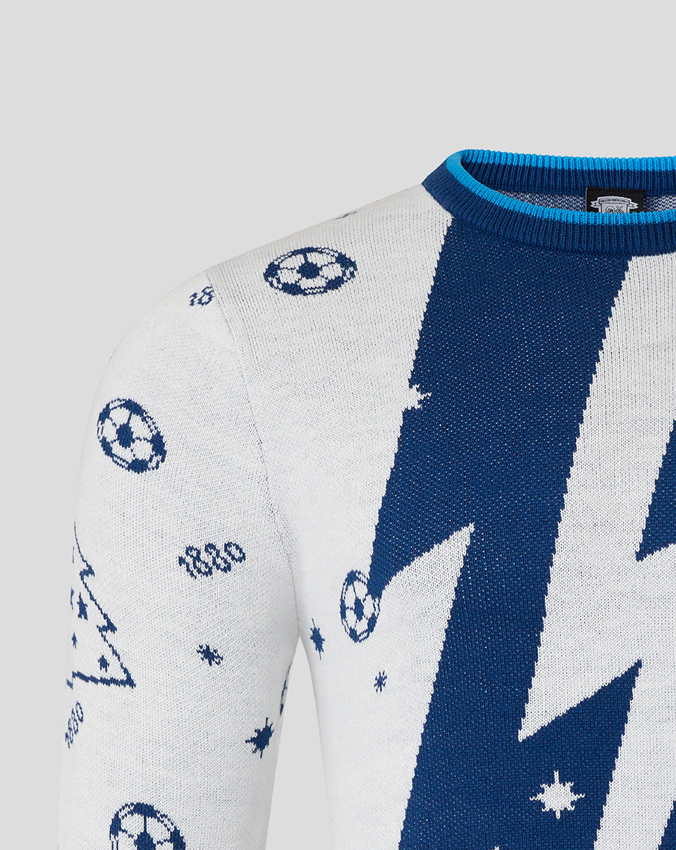 Close up of the Preston North End Christmas jumper knit showing a large navy zigzag on white with small football motifs