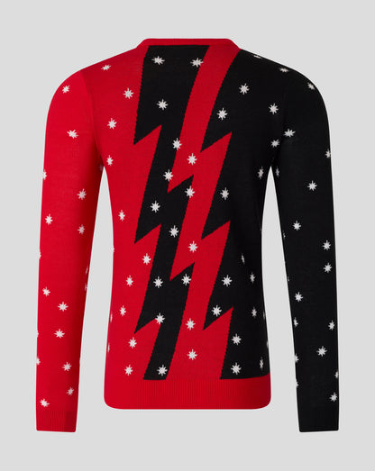 Back view of red and black Christmas jumper with bold diagonal stripe and white snowflakes