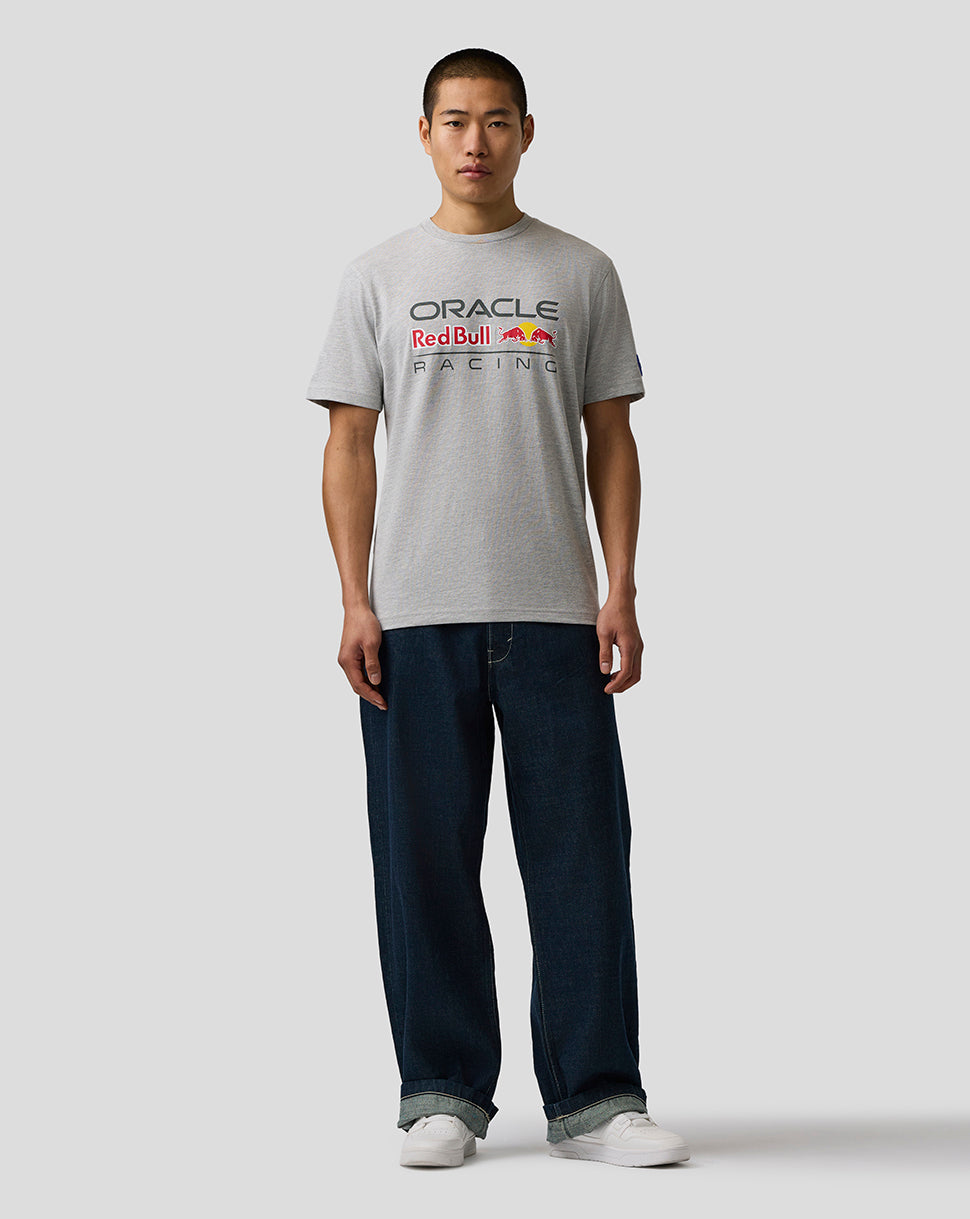 Person wearing a gray 'Oracle Red Bull Racing' t-shirt on a white background