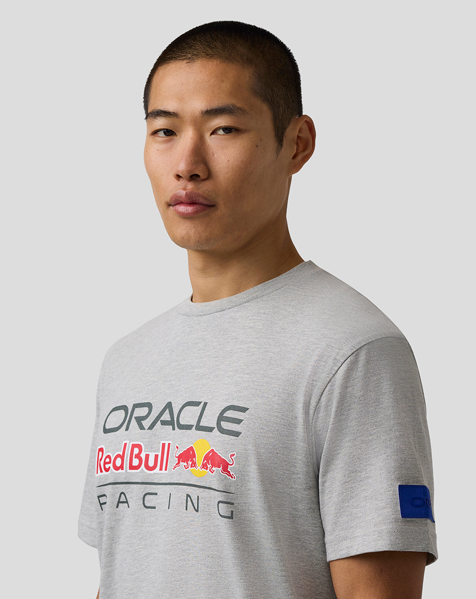 Person wearing a gray 'Oracle Red Bull Racing' t-shirt on a light gray background