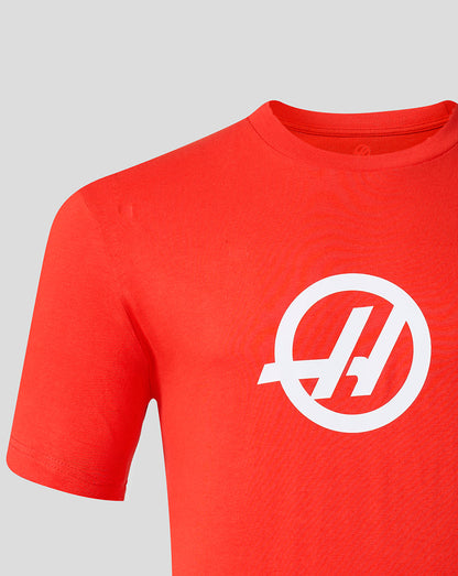 Red t-shirt with a white logo on a gray background