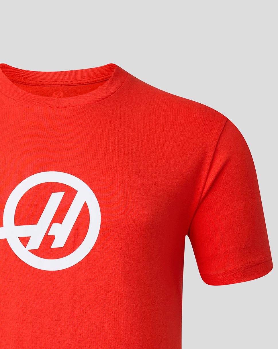 Red t-shirt with a white logo on a gray background