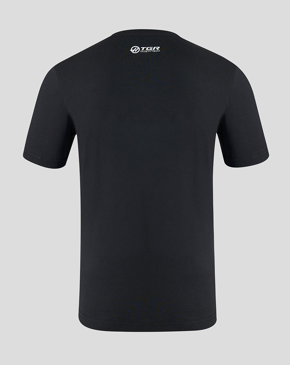 Black t-shirt with a logo on the back against a gray background