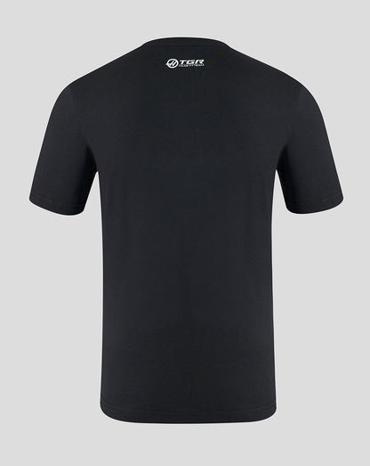 Black t-shirt with a logo on the back against a gray background