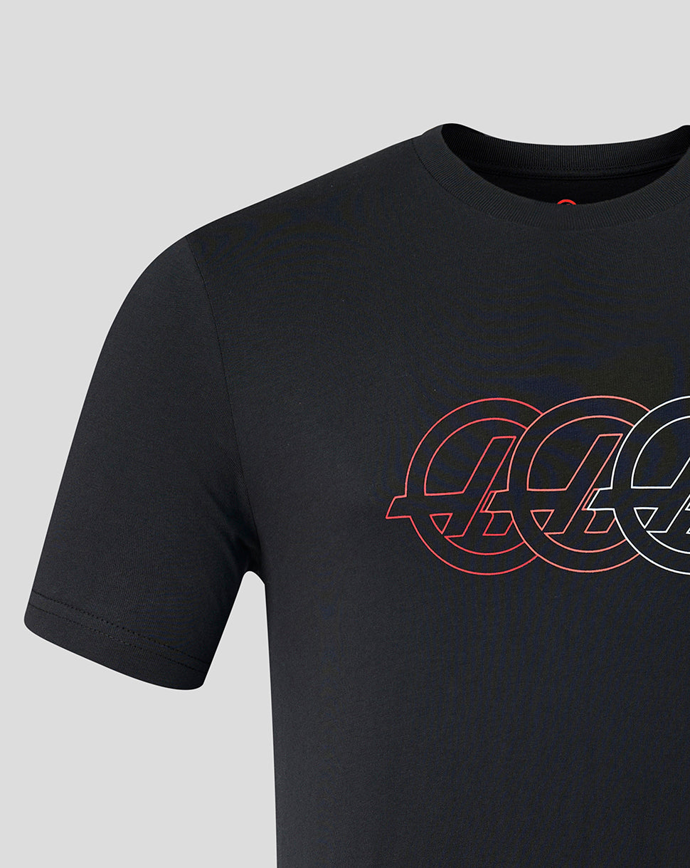 Black t-shirt with a red and white logo on a gray background