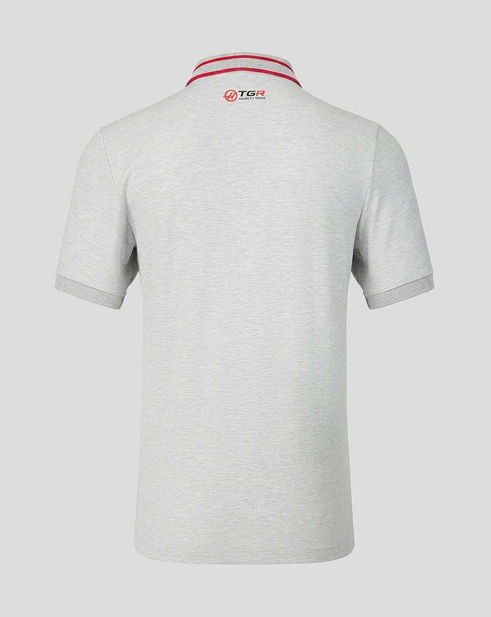 Gray polo shirt with red and white collar on a light gray background