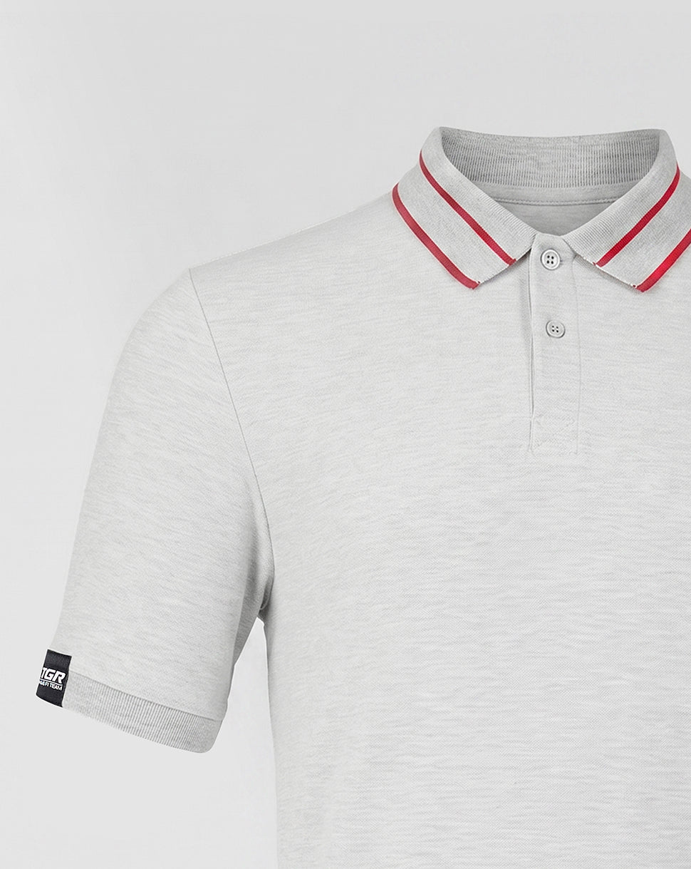Gray polo shirt with red trim on a light gray background