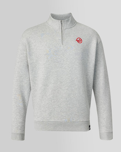 Gray pullover with a red logo on a light gray background