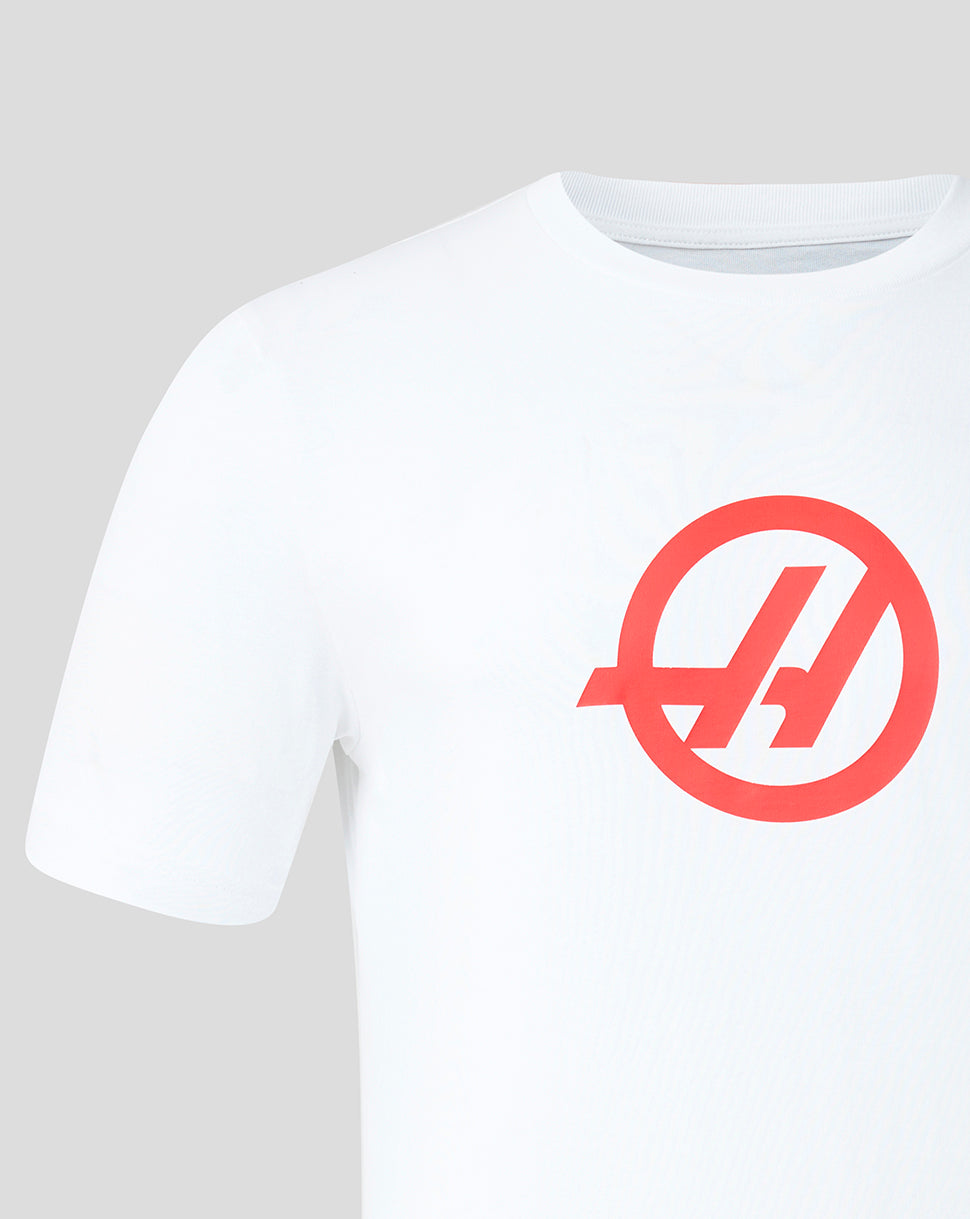 Front view of white Haas Team T shirt with a bold red circular Haas logo on the chest