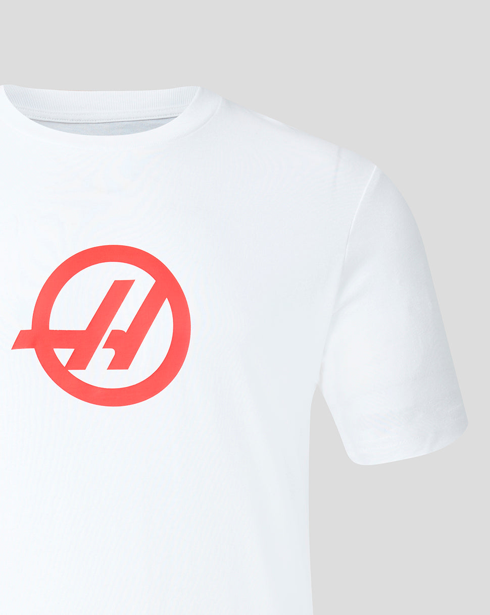 White Haas Team T shirt with a large red circular logo on the left chest