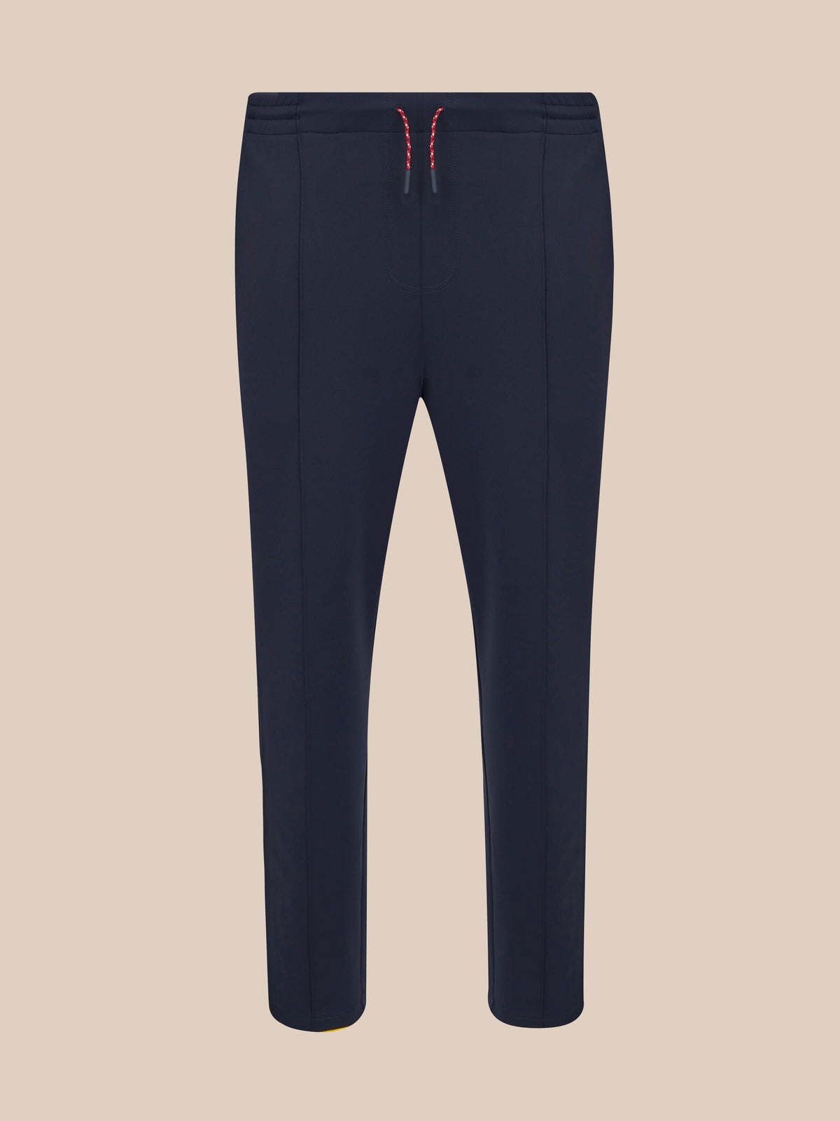 Navy unisex trousers with a drawstring waistband and red and white knit drawcords
