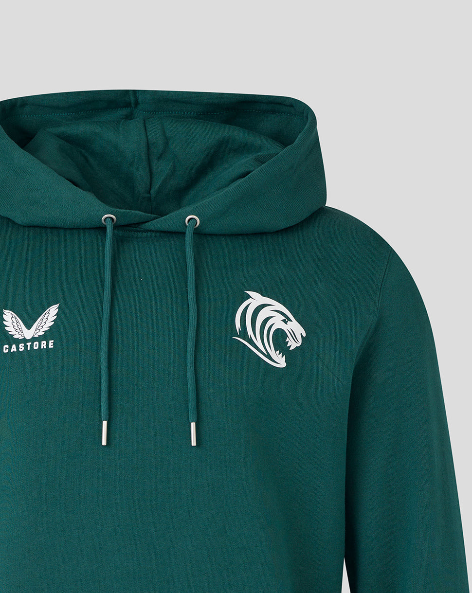 Dark green hoodie chest detail with white tiger crest on the right and Castore logo on the left, hood strings visible