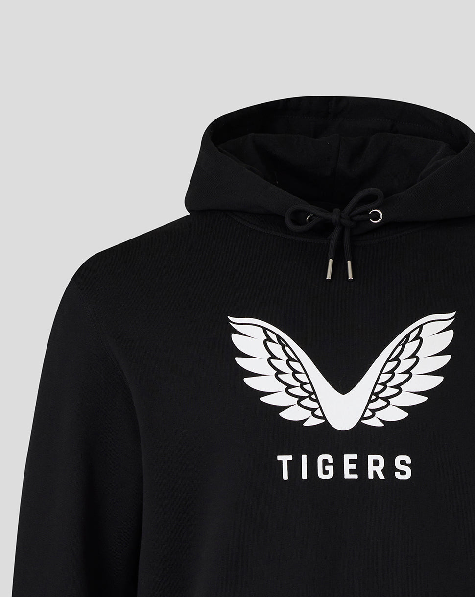 Upper chest detail of the black hoodie with a large white wing emblem.
