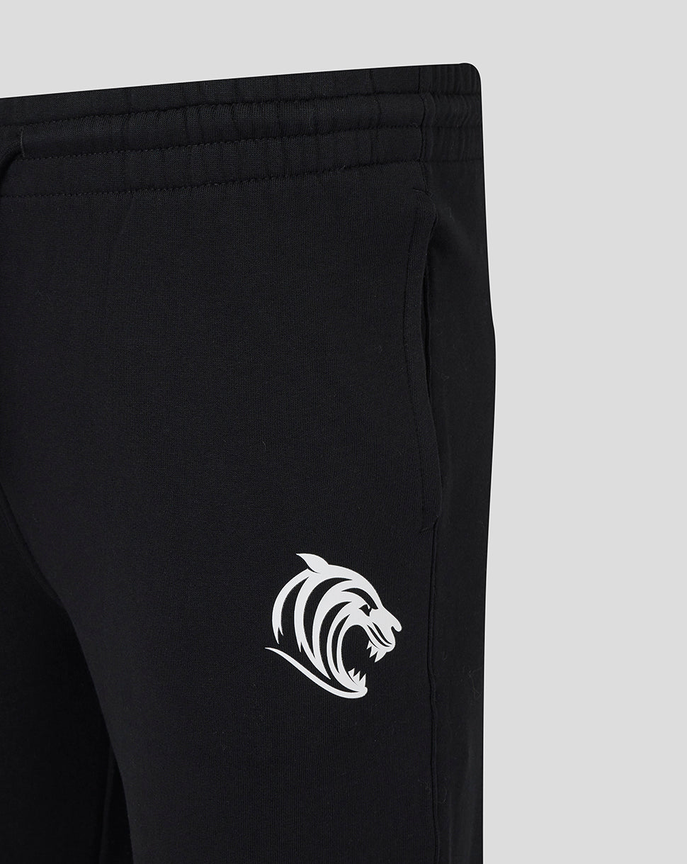 Close up of black Leicester Tigers travel essential jogger showing white tiger logo on thigh