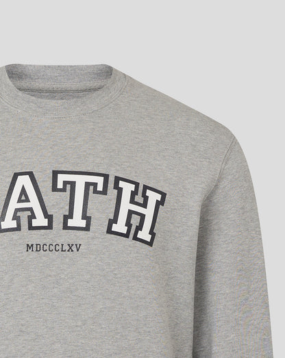 Heather grey Bath Rugby unisex varsity crew sweatshirt with bold collegiate lettering across the chest
