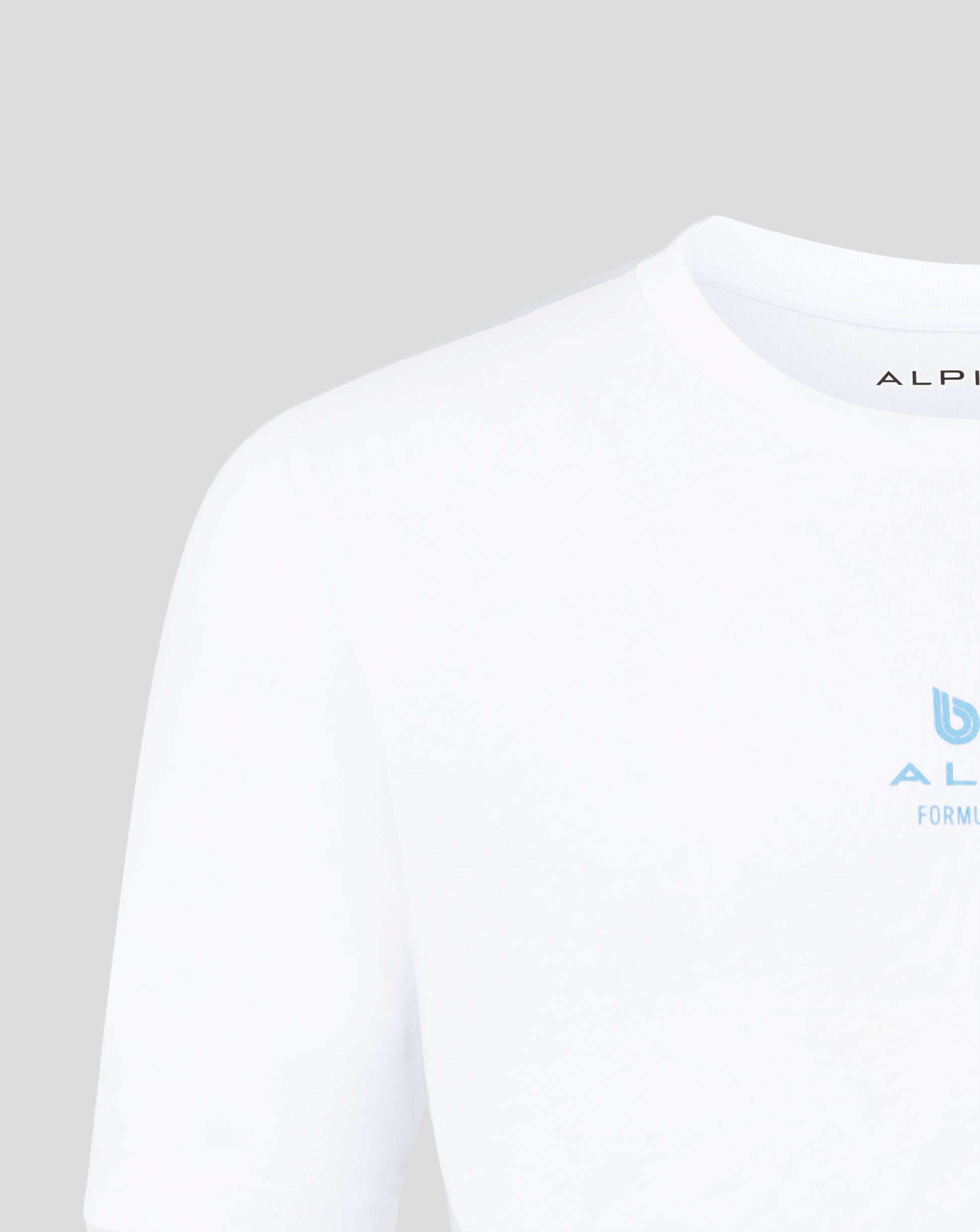 Close up of white Alpine Core Driver T shirt showing round collar and shoulder seam